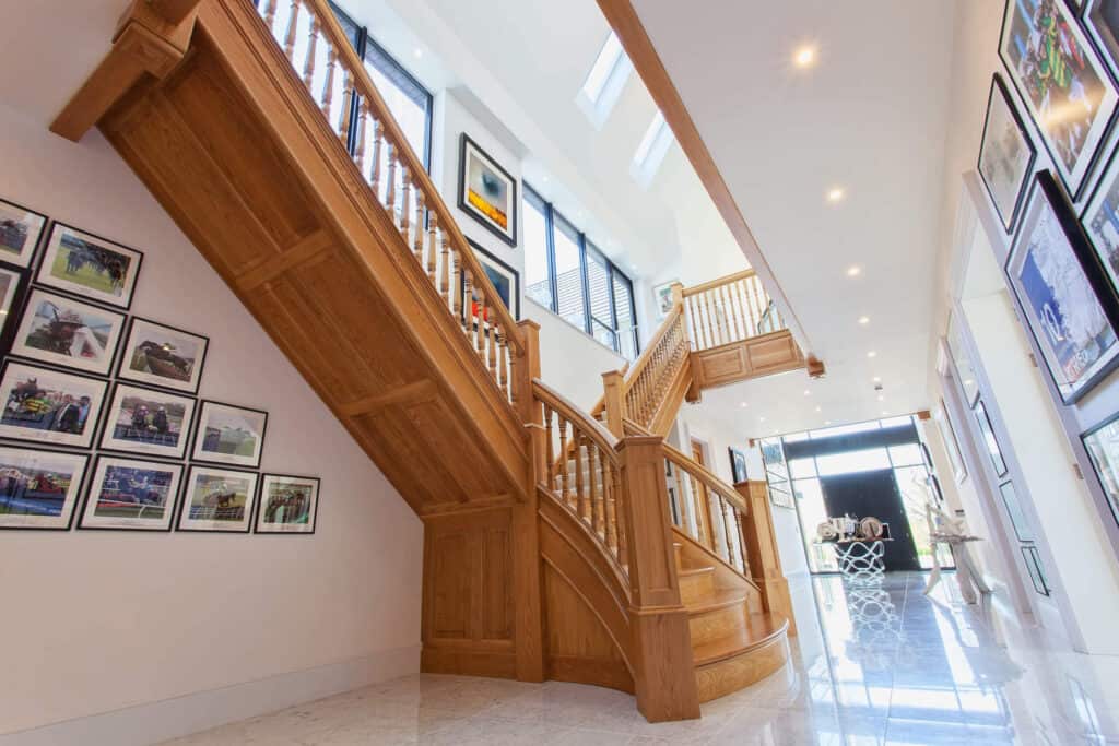Winged staircase made of high quality oak at Lambourn Woodlands