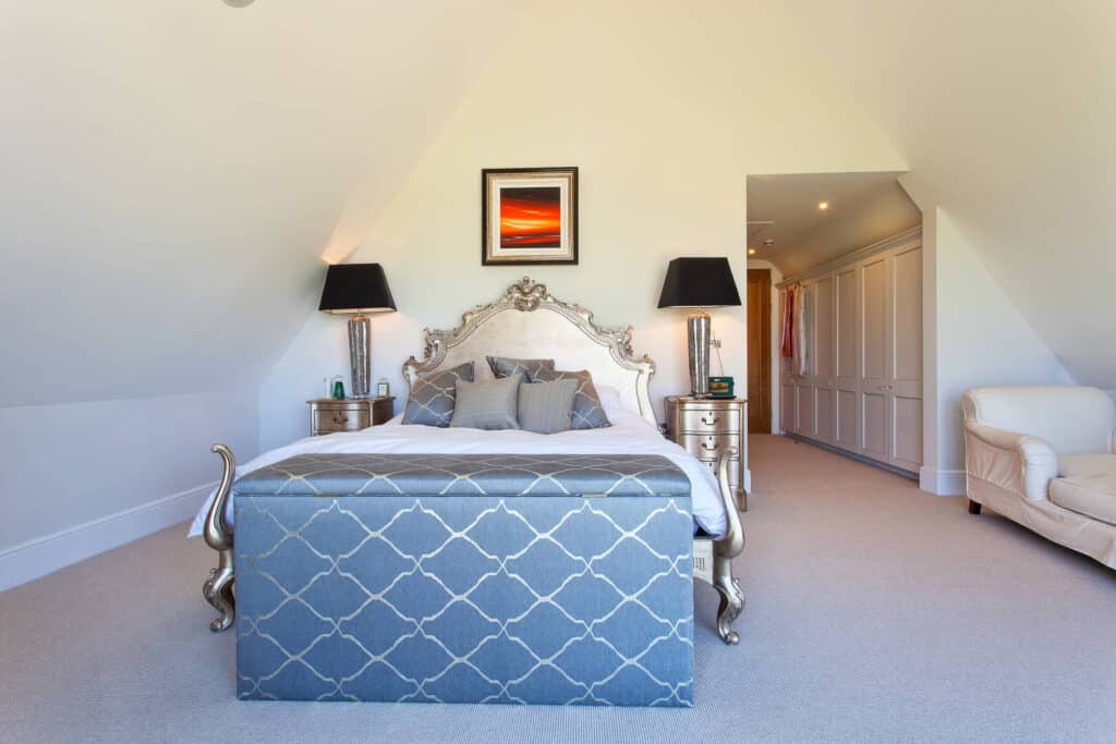 Bedroom with custom built wardrobes at Lambourn Woodlands